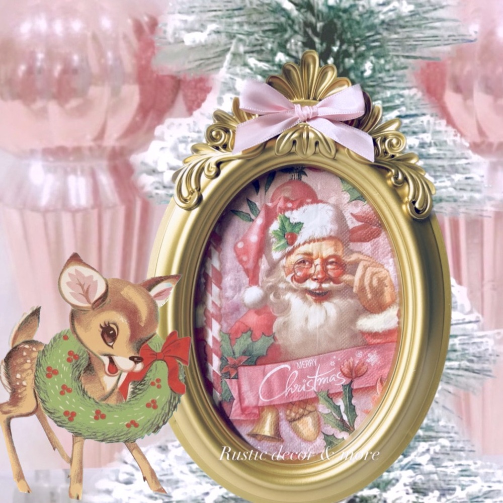 Gold vintage looking ornate frame with pink santa image.